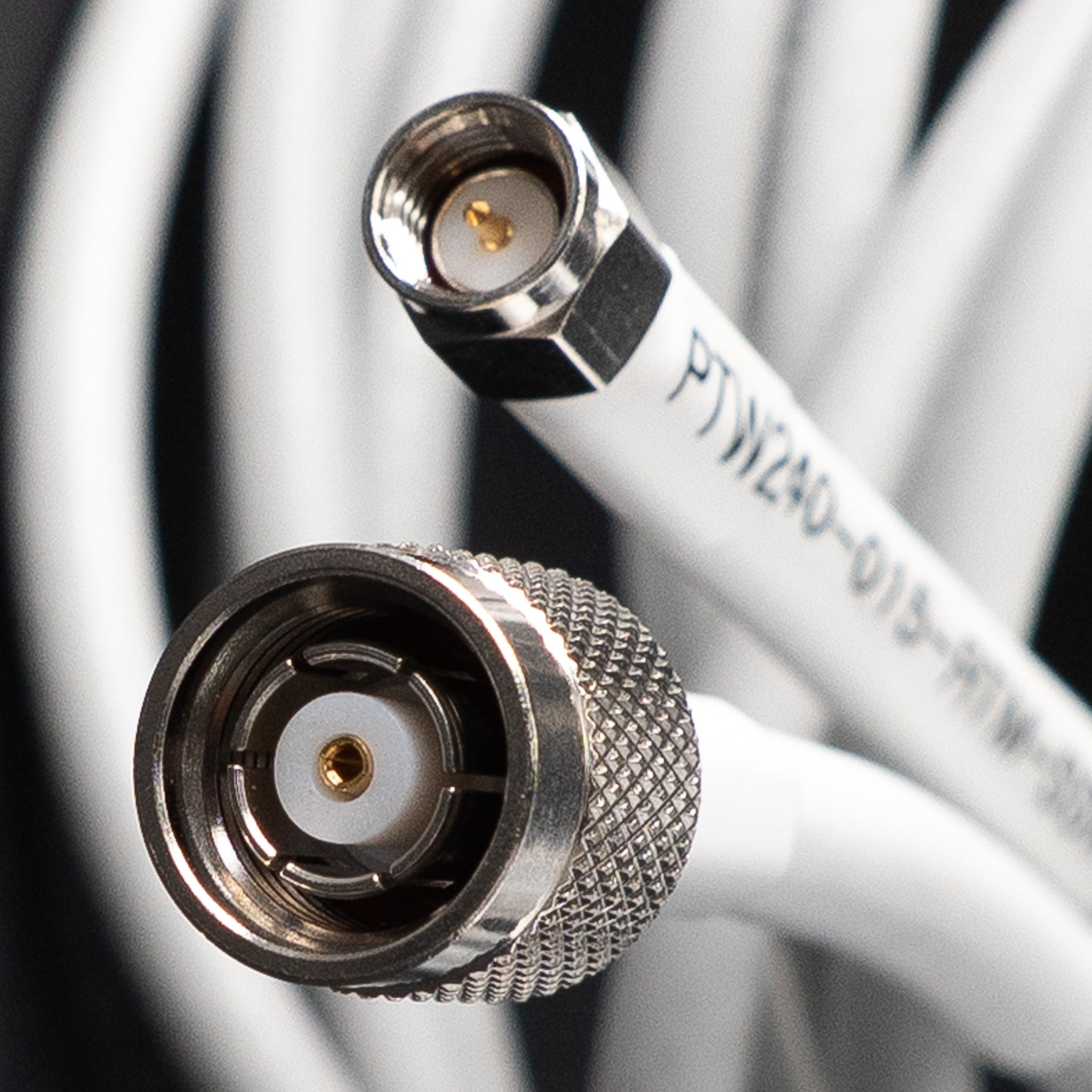 PTW240-025-RTM-SSM: 25 Feet 240 White Type Low loss Cable Assembly with Reverse Polarity TNC-Male and SMA-Male Connectors