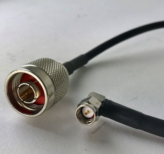 PT195-001-SNM-SSMRA: 50 Ohm (Black) LMR195 Type equivalent Type Coaxial Cable. 1 Foot With Standard N Male And Standard SMA Male - Right Angle